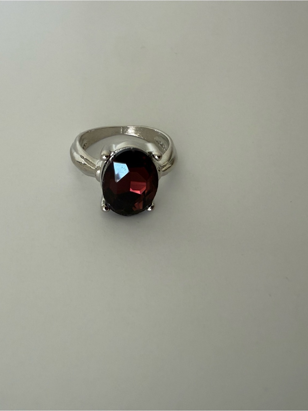 Silver Ring with Deep Red Oval Gemstone